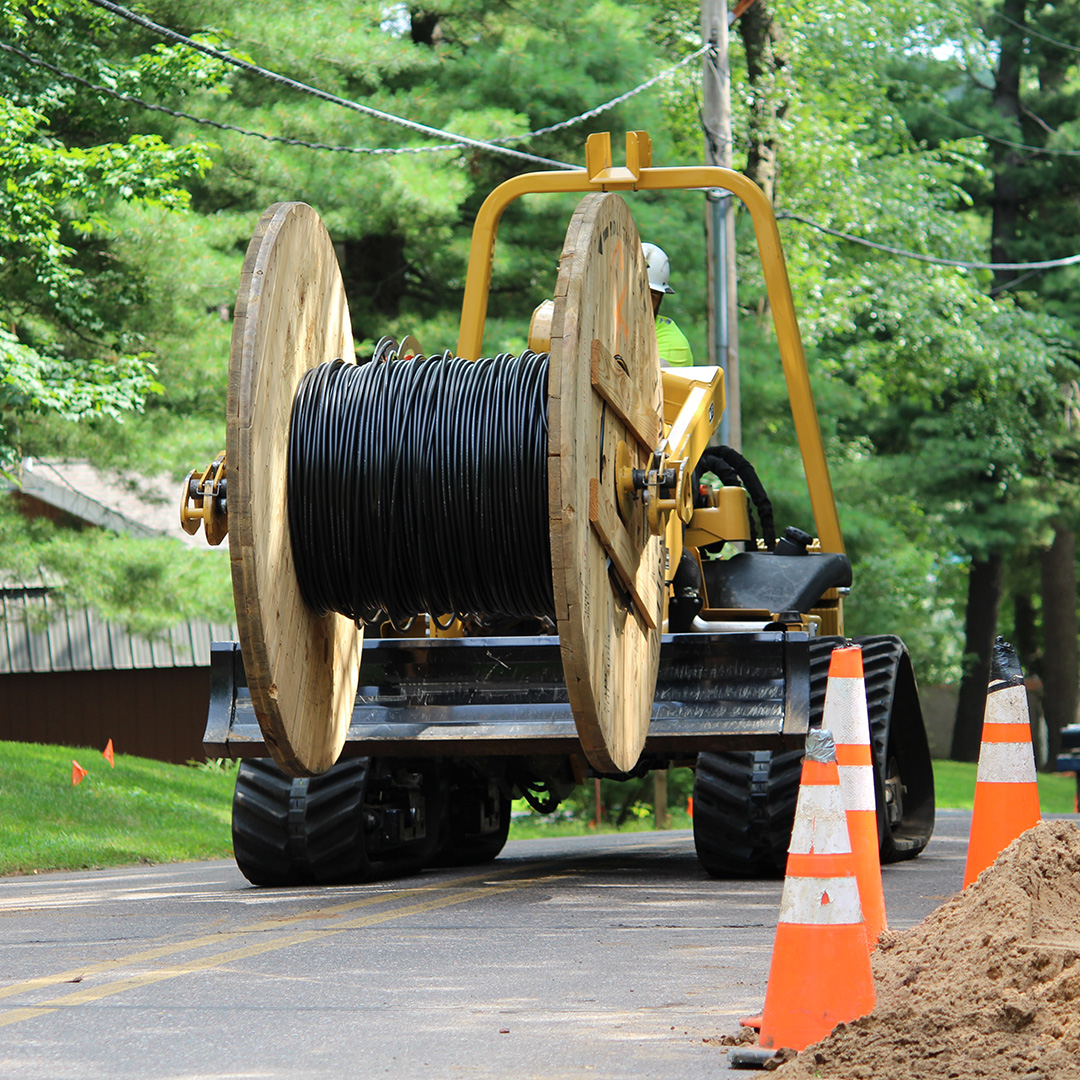 fiber construction crew bringing fiber cables to new communities